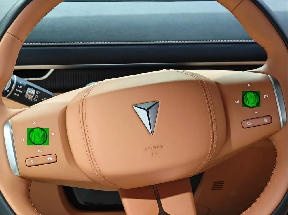Steering wheel with the left and right scroll wheels marked
